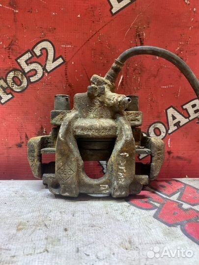 Суппорт тормозной передний левый Renault Logan 2