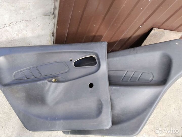 Задняя дверная карта левая ваз 2114