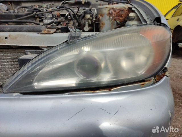 Фара левая Nissan Primera P11 седан QG18 2000