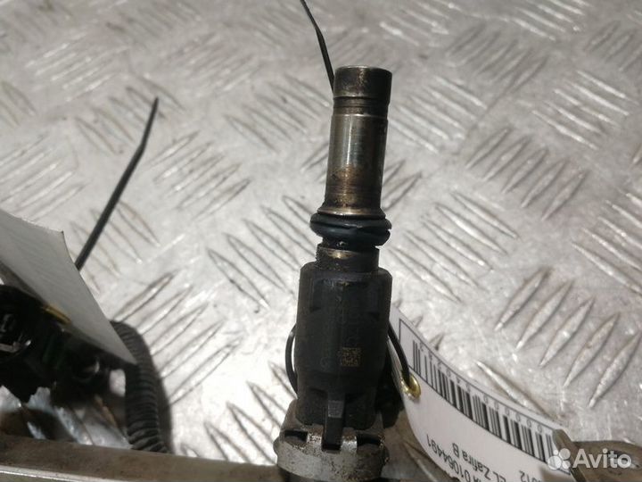 Форсунка двигателя Opel Zafira B