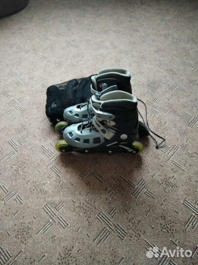 Роликовые коньки