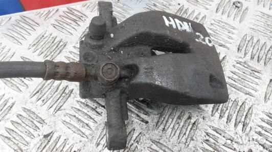 Суппорт тормозной задний правый toyota avensis T25