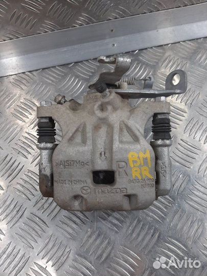 Суппорт задний правый Mazda 3 BM