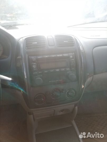 Накладка в торпедо Mazda 323 BJ