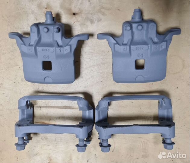 Суппорт тормозной передний Nissan