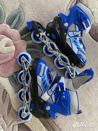 Роликовые коньки