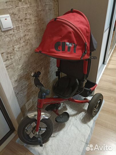 Велосипед трёхколёсный с ручкой