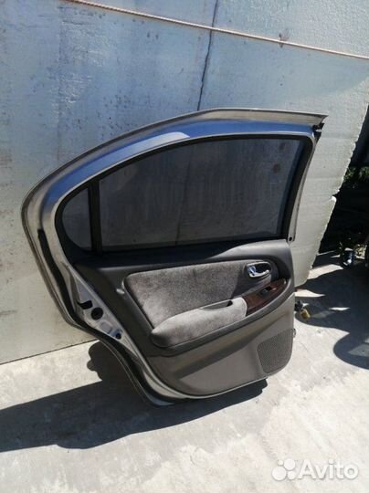 Дверь задняя левая Nissan Cefiro A33