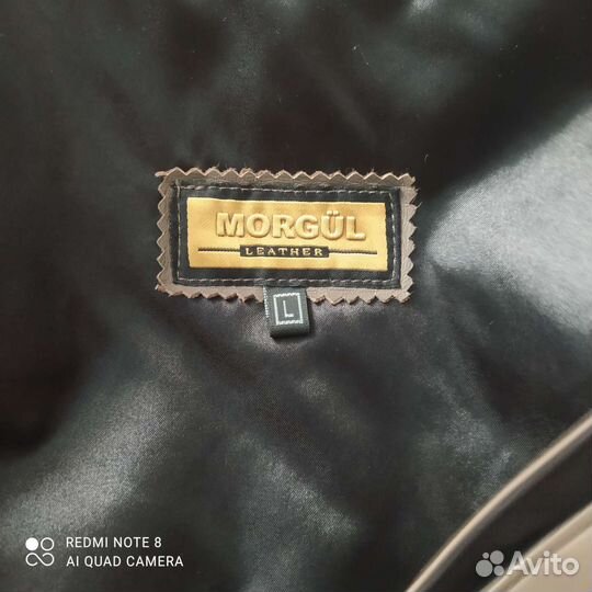 Короткая женская кожаная курточка