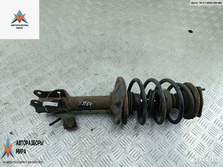 Стойка передняя Nissan Almera N16 рест. 2004