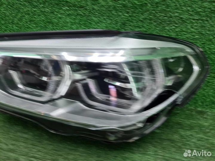 Фара левая BMW X3