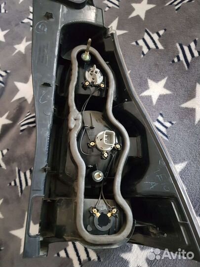 Фонарь задний левый Toyota Hilux Surf