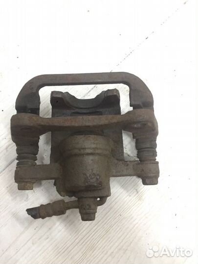 Суппорт задний левый Chevrolet Lacetti седан F14D3