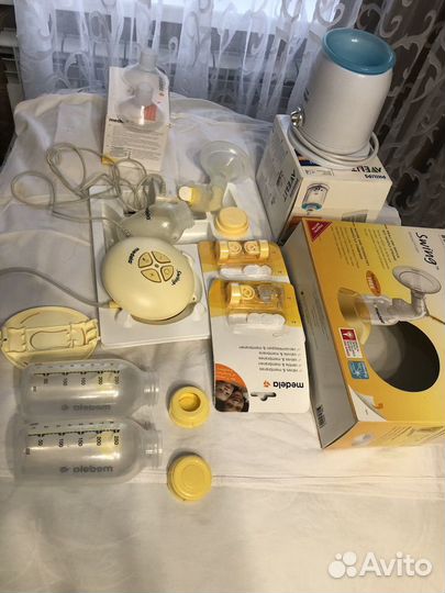 Молокоотсос medela