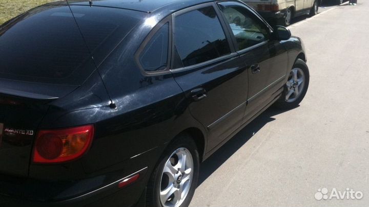 Заднее стекло на Hyundai Elantra XD Avante