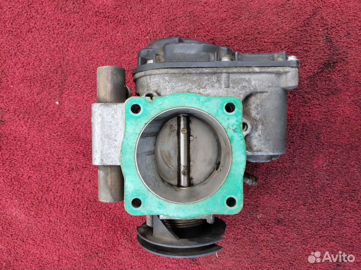 Дроссельная заслонка Ауди A4. 058 133 063