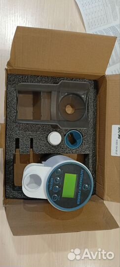 Автоматическая кормушка для рыб