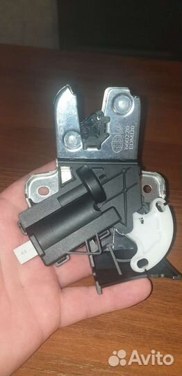 Замок багажника passat б6