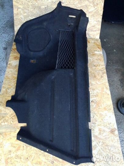 Обшивка багажника правая Opel Astra J седан 1.6