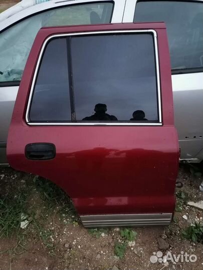 Задняя правая дверь Kia Sportage 1