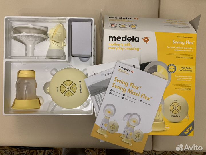 Молокоотсос medela swing flex