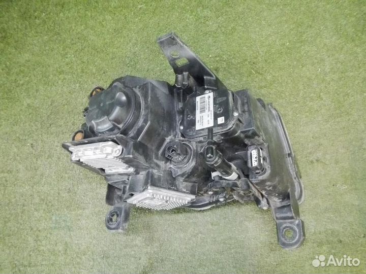 Фара левая Jeep Grand Cherokee