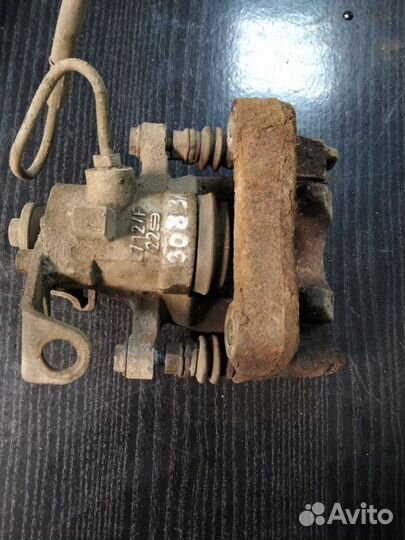 Суппорт тормозной задний левый Peugeot 308 EP6