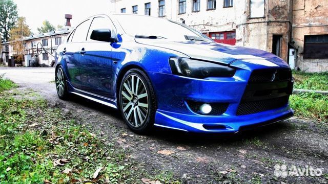 Накладка на передний бампер mitsubishi lancer