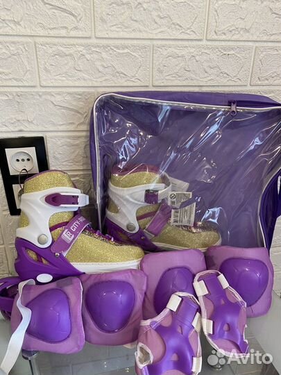 Роликовые коньки