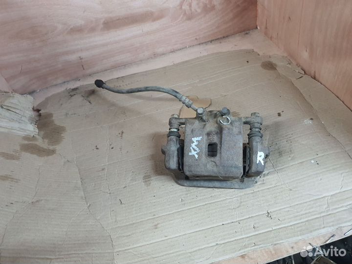 Суппорт задний правый kia sorento 2 xm