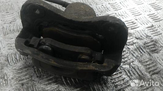 Суппорт тормозной передний левый hyundai tucson JM