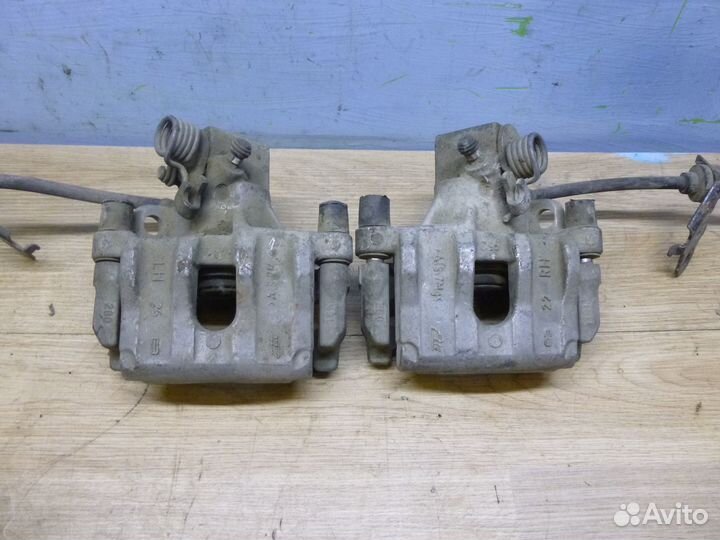 Суппорт задний левый,правый Mazda 3 (BK) 2002-2009