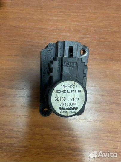 Моторчик заслонки отопителя Opel Astra H