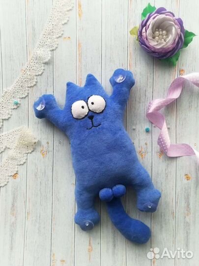 Кот на присосках