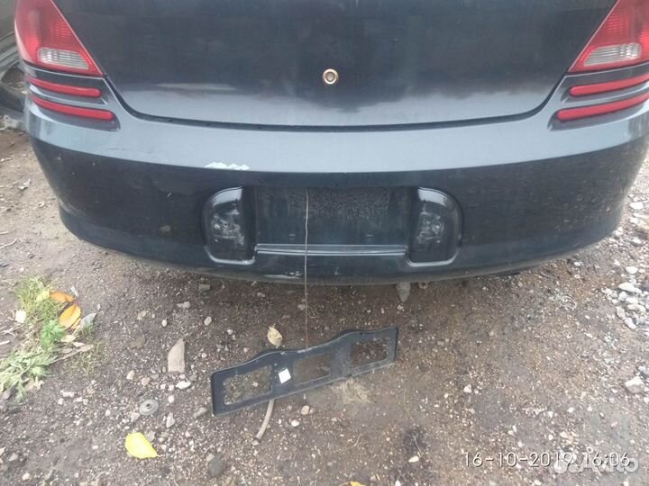 Задний бампер на Додж Стратус 2002 года
