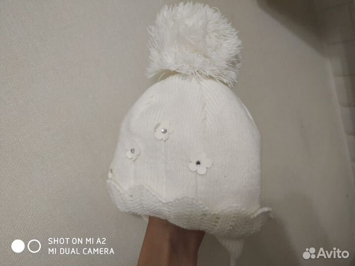 Теплая шапочка для новорожденной