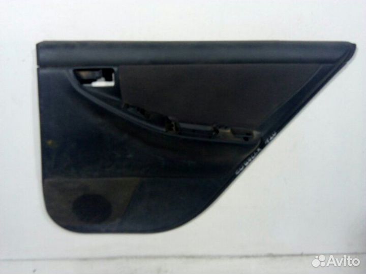 Обшивка двери задняя правая Toyota Corolla 120