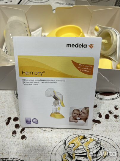 Молокоотсос medela ручной