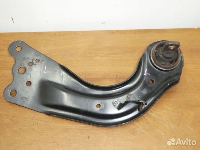 Задний продольный рычаг левый Mazda 6 gj