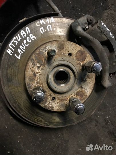 Диск тормозной передний правый Mitsubishi Lancer