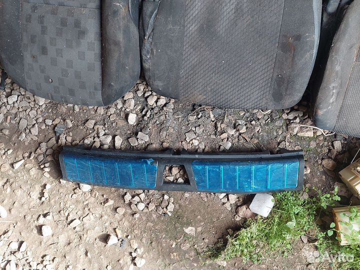 Обшивка багажника на заднюю панель Джили кулрей