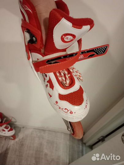 Роликовые коньки