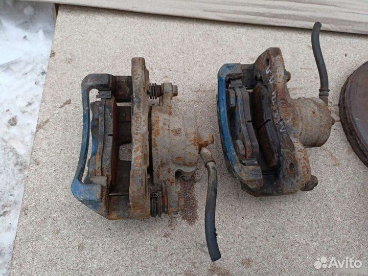 Суппорт тормозной передний Chevrolet Lacetti