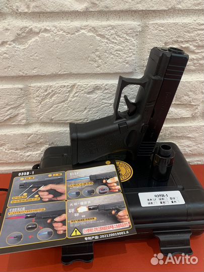 Зажигалка в виде пистолета Hellcat с глушителем