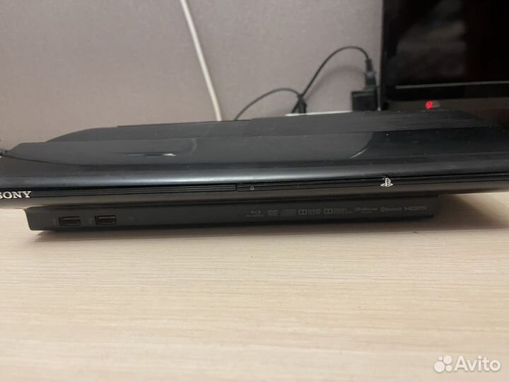 Прошитая PS3 super slim, куча игр, два дойстика