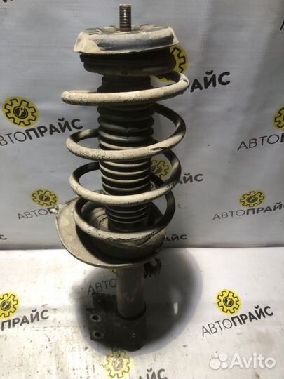 Стойка с пружиной в сборе передняя правая Peugeot