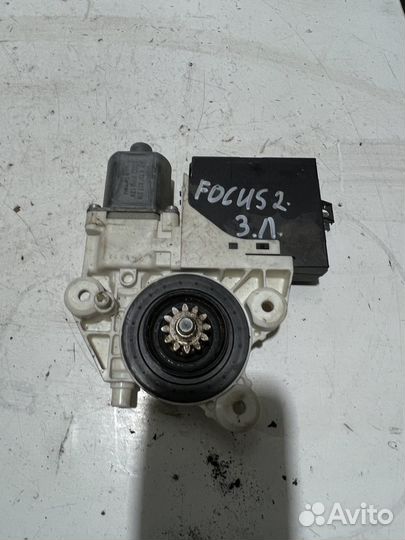 Моторчик стеклоподъемника задний лев. Ford Focus 2