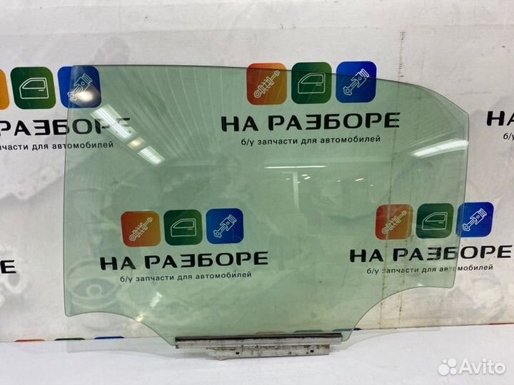 Стекло двери заднее левое Toyota Corolla 150