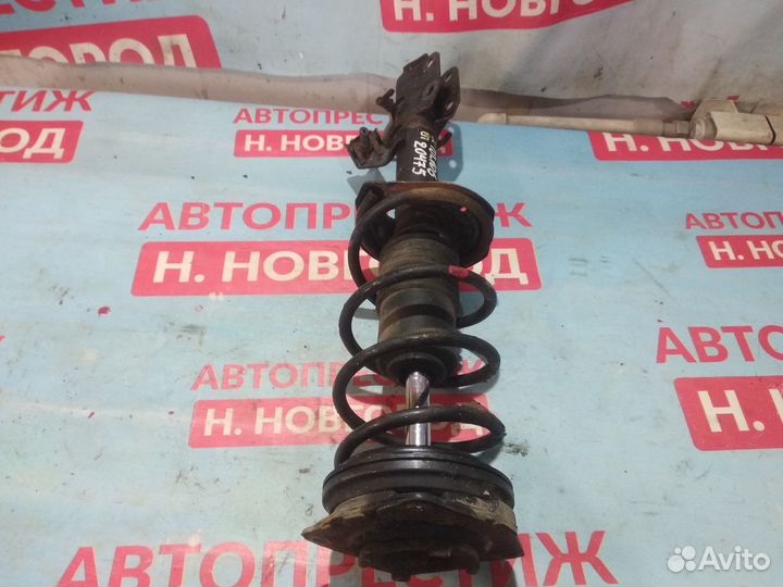 Стойка передняя правая Nissan March K12