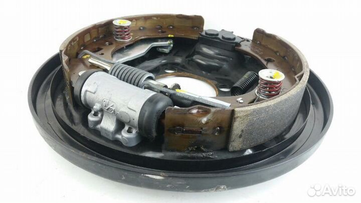 Механизм тормозной задний левый Toyota Corolla